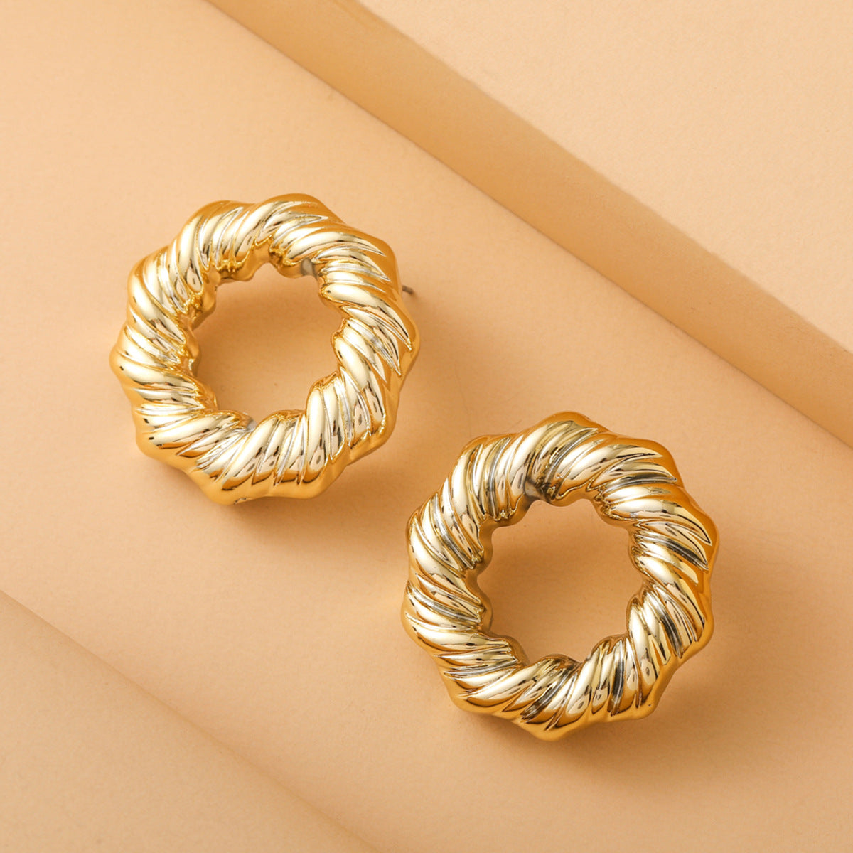 Madrid bold spiral gold plated earring SJP