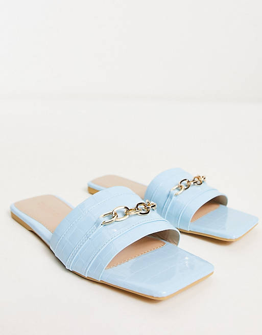 Truffle Collection Wide Fit chain loafer sliders in blue crocs