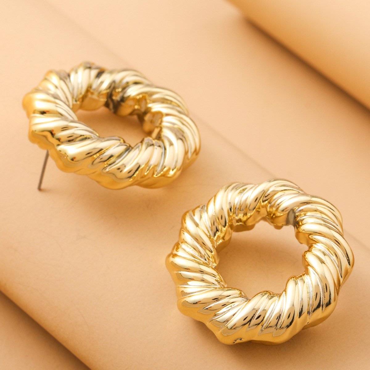 Madrid bold spiral gold plated earring SJP