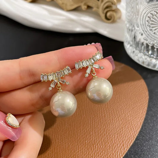Luxury Zicornia pearl bow Earring SJP