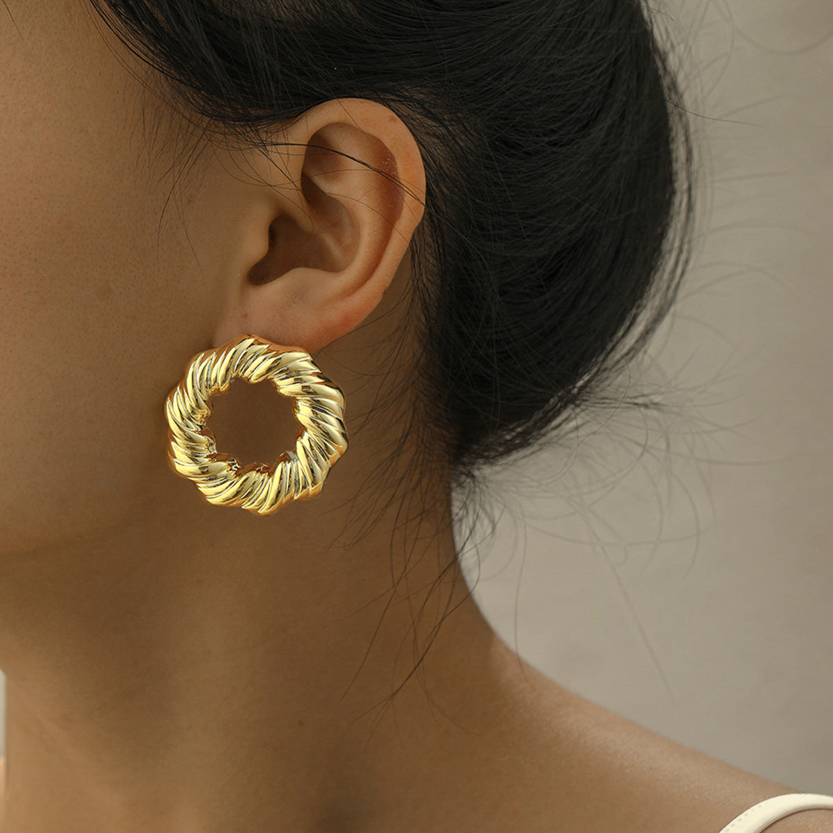 Madrid bold spiral gold plated earring SJP