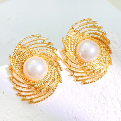 Exagerated spiral pearl gold stud earrings SJP