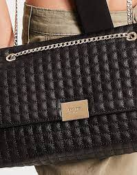 Dune quilted PU chain strap cross body bag in Black